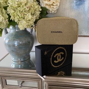 Chanel bag.  Add a strap to make it a purse.